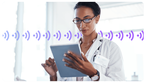 Woman doctor on tablet